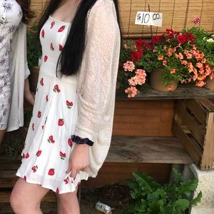 White dress with strawberries on it